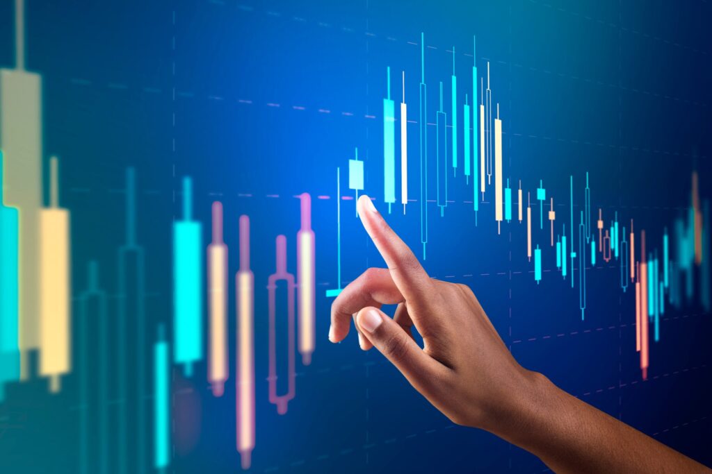 Stock market chart on virtual screen with woman&rsquo;s hand digital remix